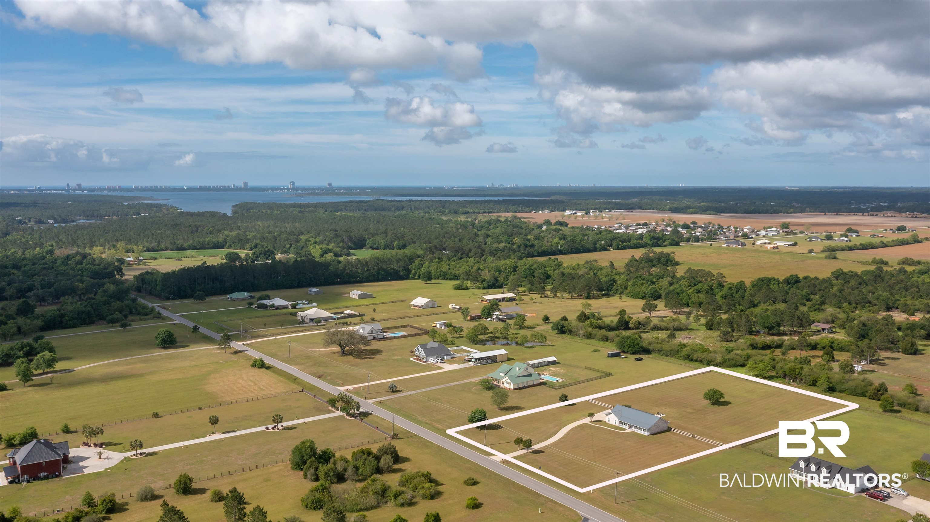 9855 Stucki Road Elberta, AL 36530 - Photo 6 of 54 Aerial overview of property's location featuring property boundaries highlighted and a nearby body of water