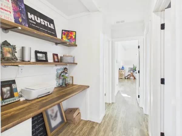 a view of dining room and wooden floor