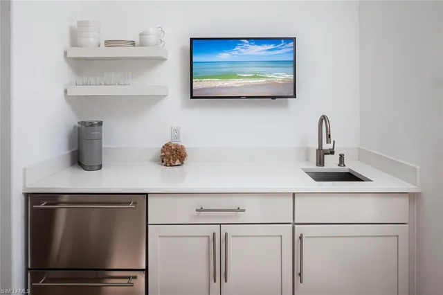 a kitchen with appliances cabinets and a counter top