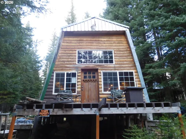 a view of house with outdoor space