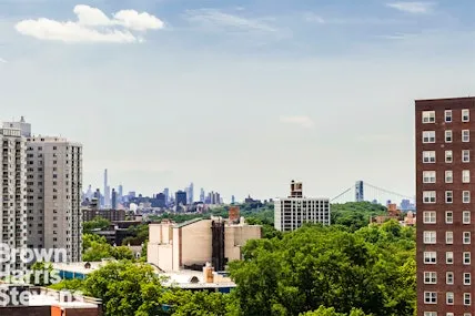 a view of a city with tall buildings