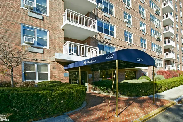 a view of a chair and table in the garden