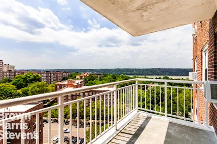 a view of a balcony with city view