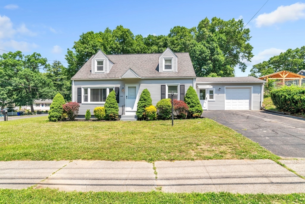800 Wilbraham Road Springfield, MA 01109 - Photo 1 of 21 a front view of a house with a yard