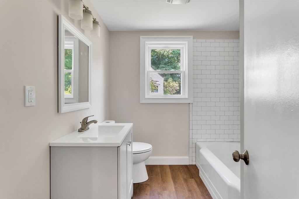 800 Wilbraham Road Springfield, MA 01109 - Photo 11 of 21 a bathroom with a sink a toilet and a window