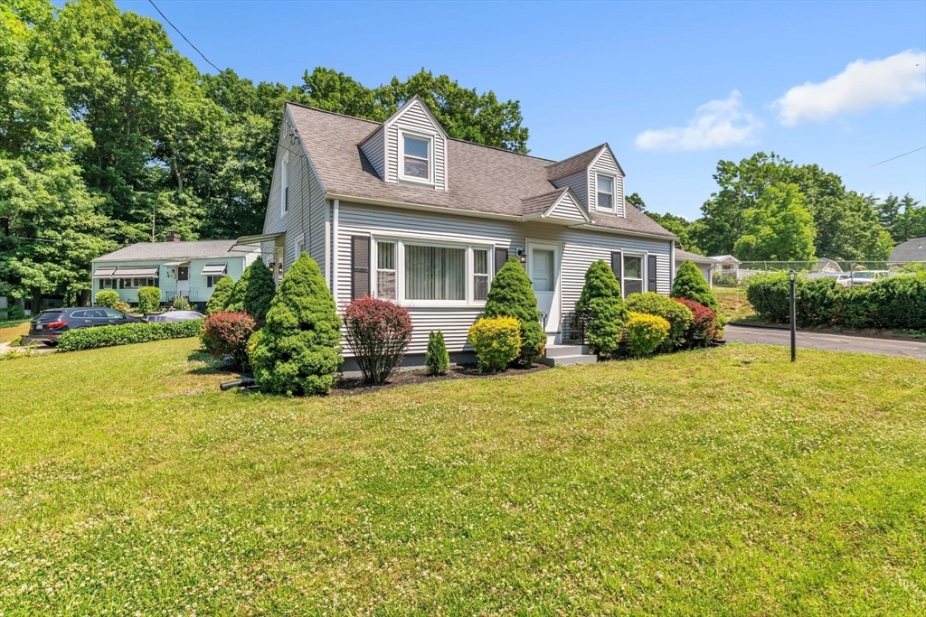 800 Wilbraham Road Springfield, MA 01109 - Photo 2 of 21 a front view of a house with garden