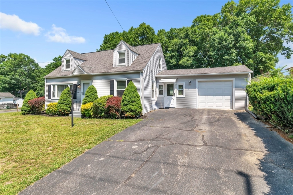 800 Wilbraham Road Springfield, MA 01109 - Photo 3 of 21 a front view of a house with garden