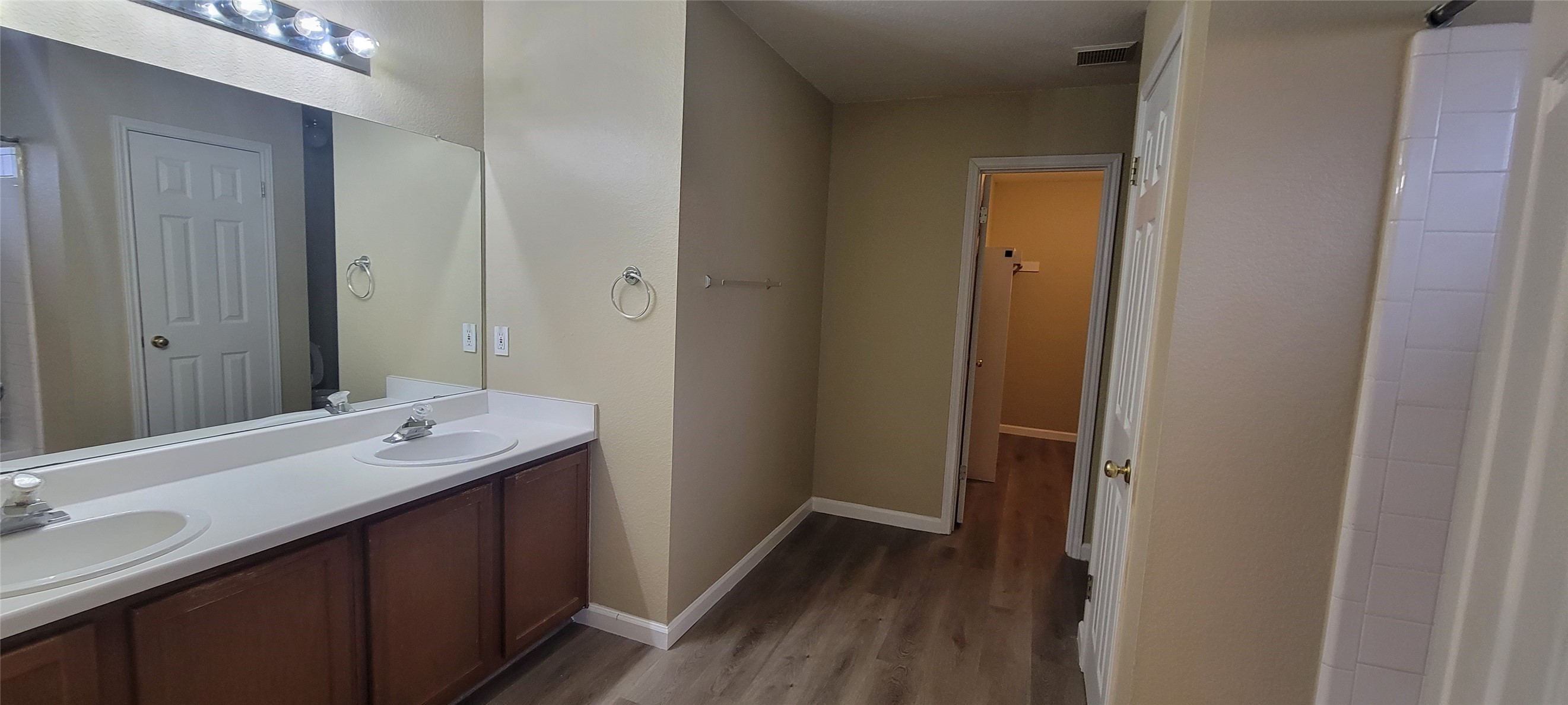 618 Elizabeth Lane Bastrop, TX 78602 - Photo 13 of 18 View looking toward the walk in closet in the primary bathroom