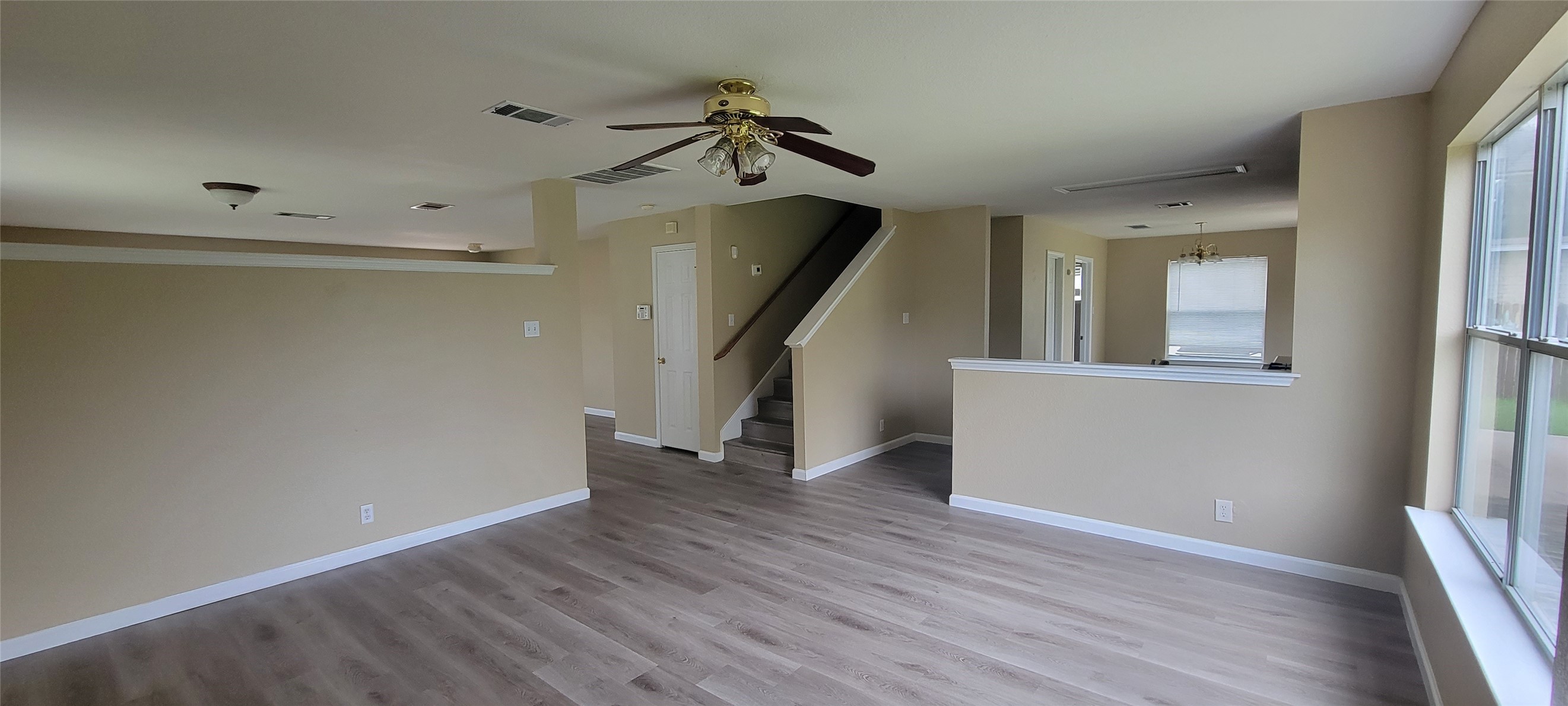618 Elizabeth Lane Bastrop, TX 78602 - Photo 2 of 18 View of living room looking into Kitchen and Dining Room