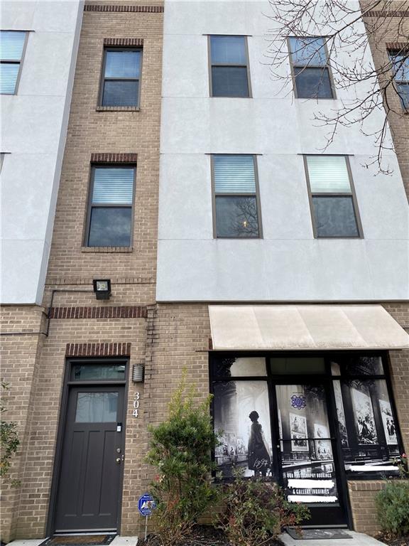2030 Main Street Northwest, Unit 304 Atlanta, GA 30318 - Photo 1 of 1 a view of front door of house