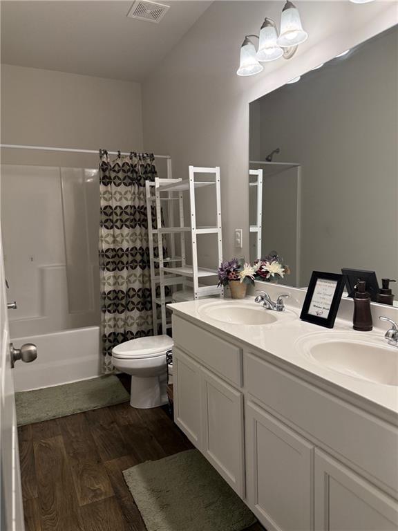 358 Mulberry Road Winder, GA 30680 - Photo 14 of 21 a bathroom with a sink toilet and shower