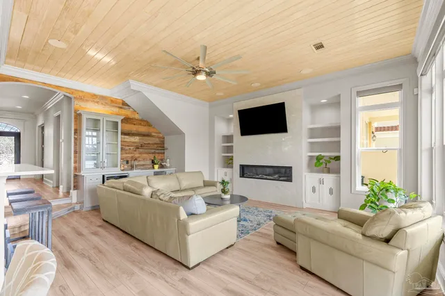 a kitchen with stainless steel appliances granite countertop a stove and a refrigerator