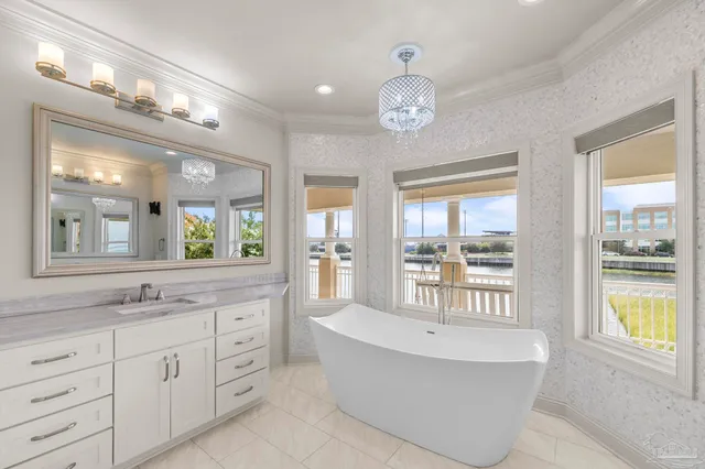 an aerial view of house with yard swimming pool and outdoor seating