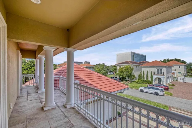 an aerial view of a chairs and table on the wall