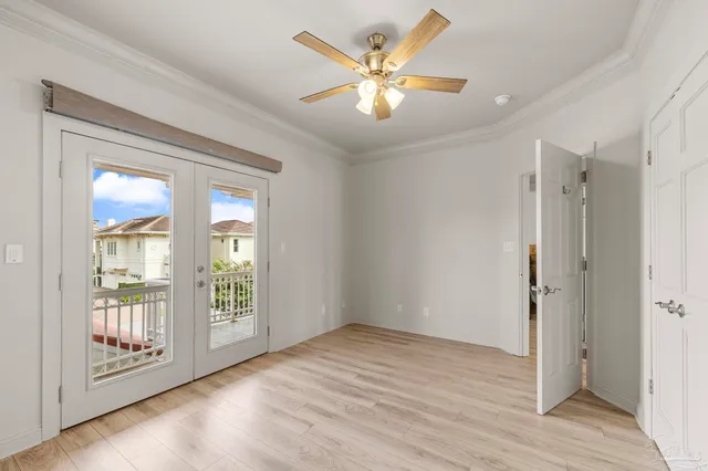 an aerial view of a city with ocean view