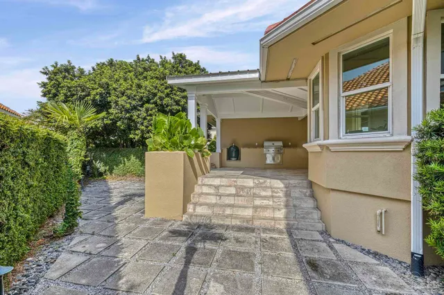 an aerial view of a house with a lake view