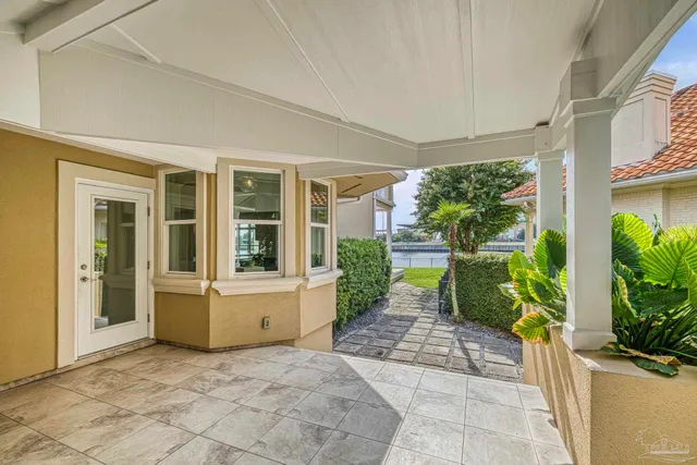 a view of multiple houses with outdoor space
