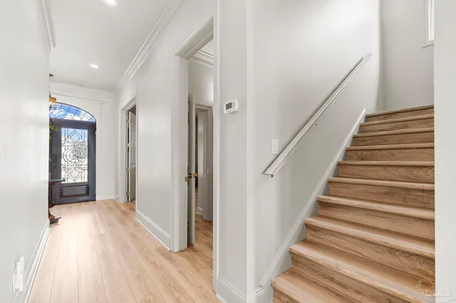 a living room with furniture fireplace and a flat screen tv
