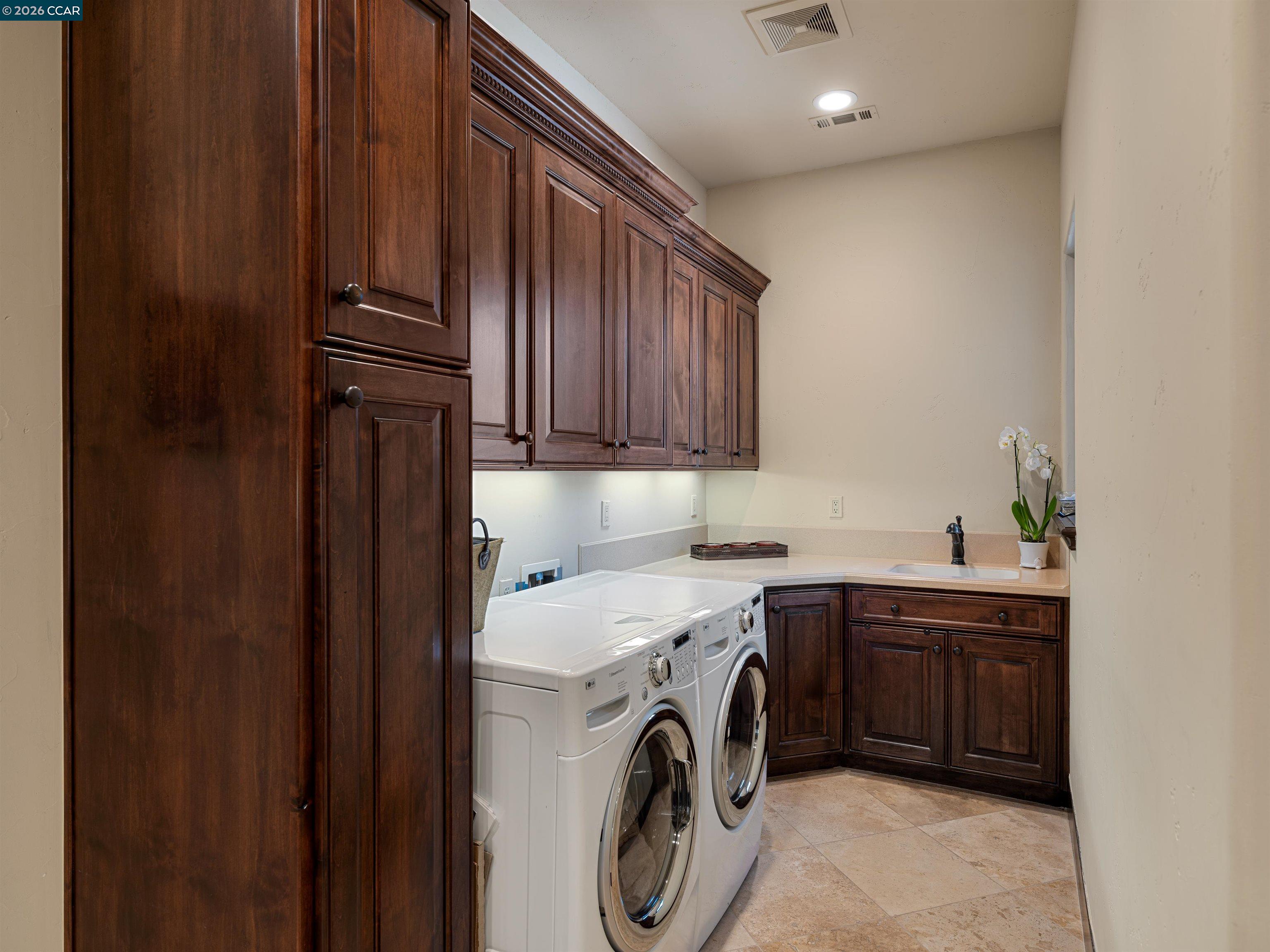 2020 Victorine Road Livermore, CA 94551 - Photo 60 of 99 a utility room with sink dryer and washer