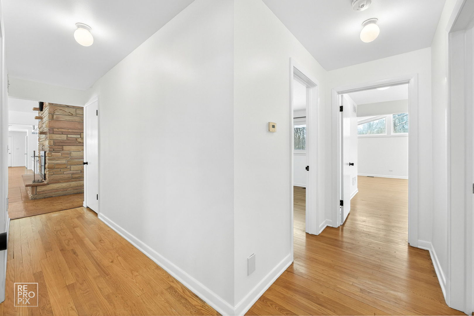 23670 North Elm Road Lincolnshire, IL 60069 - Photo 15 of 36 wooden floor in a hall with an entryway