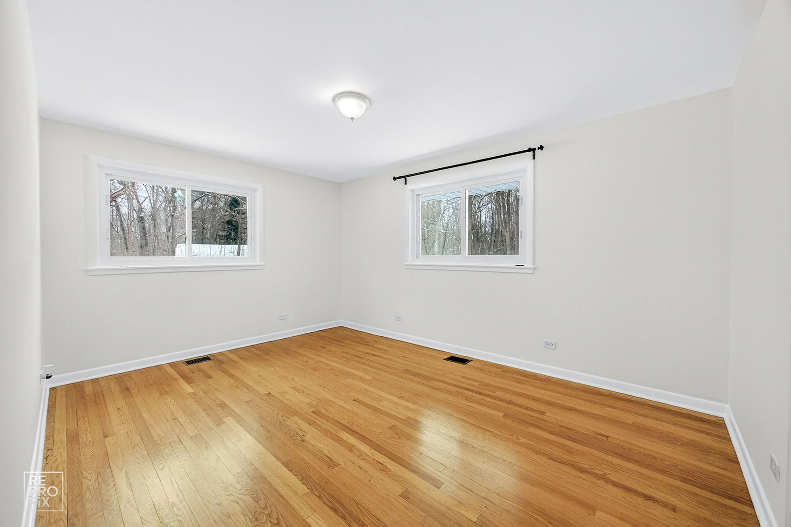 23670 North Elm Road Lincolnshire, IL 60069 - Photo 16 of 36 a view of empty room with wooden floor