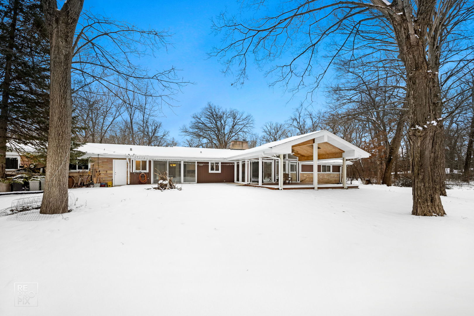 23670 North Elm Road Lincolnshire, IL 60069 - Photo 36 of 36 a front view of a house with a yard