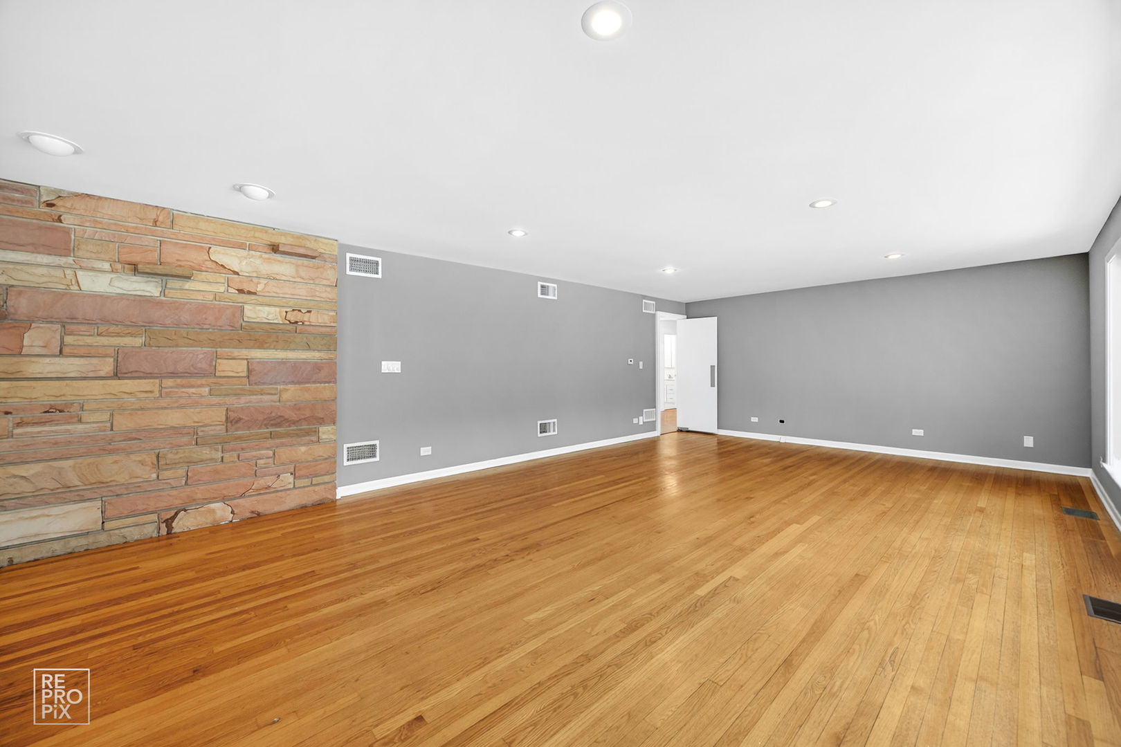 23670 North Elm Road Lincolnshire, IL 60069 - Photo 6 of 36 a view of empty room with wooden floor