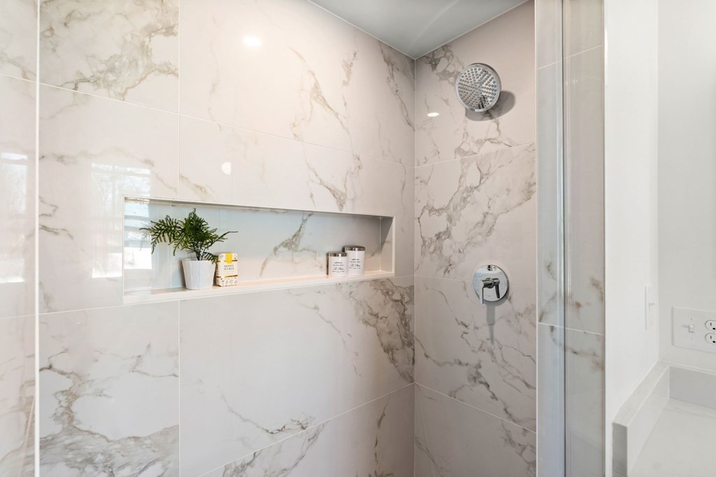 111 Leach Street, Unit 1 Salem, MA 01970 - Photo 18 of 32 a bathroom with a shower and a mirror