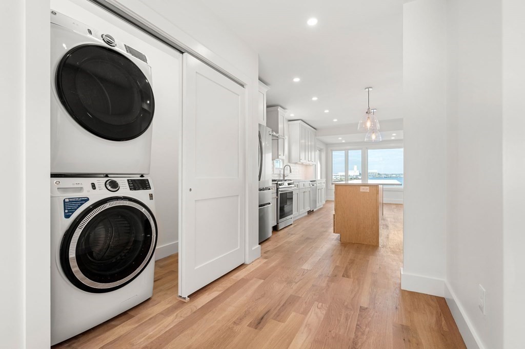 111 Leach Street, Unit 1 Salem, MA 01970 - Photo 8 of 32 a view of a kitchen with washer and dryer