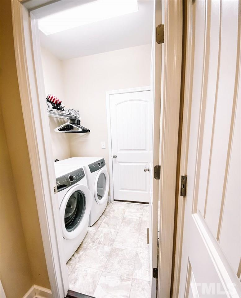 7989 Creech Road Middlesex, NC 27557 - Photo 9 of 20 a utility room with dryer and washer