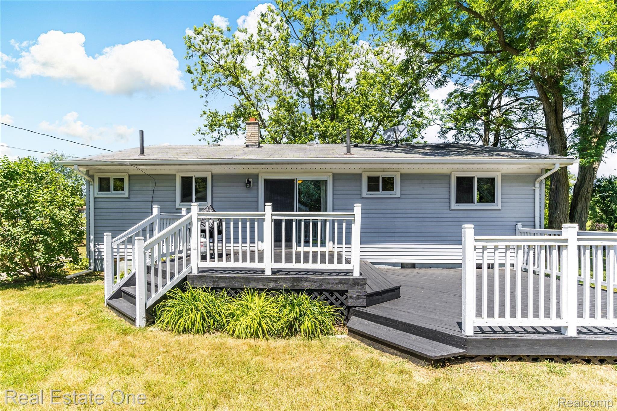 5131 Maybee Road Clarkston, MI 48346 - Photo 3 of 29 Large, newer deck for your outdoor enjoyment