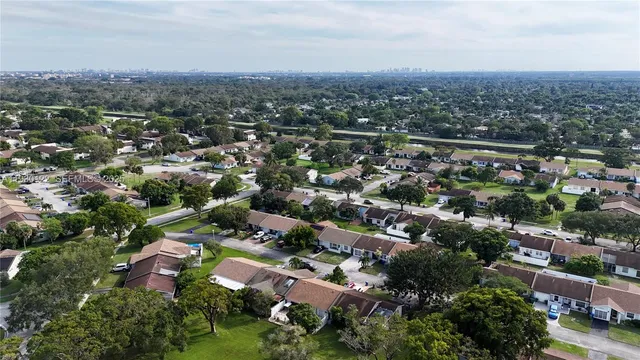 an aerial view of a city with lots of residential buildings