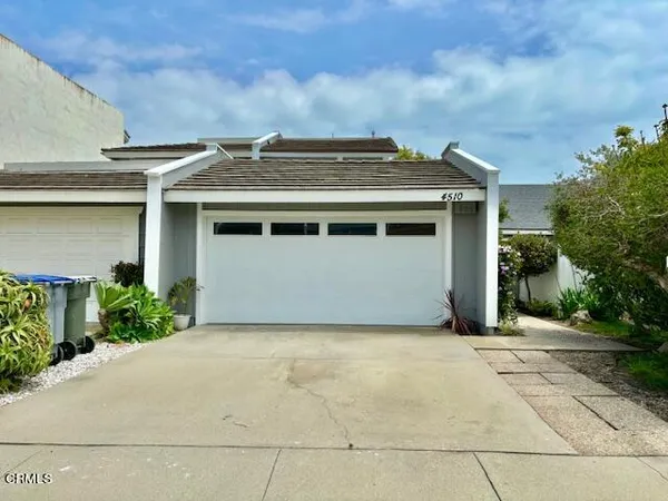 a view of a house with a garage
