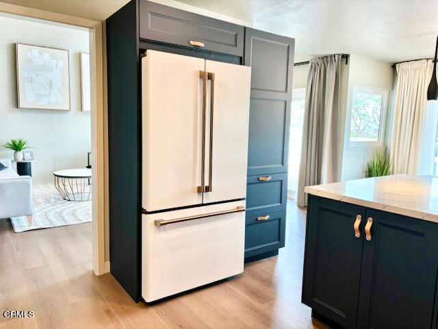 4510 Gateshead Bay Oxnard, CA 93035 - Photo 13 of 34 a kitchen with stainless steel appliances granite countertop a refrigerator and a sink