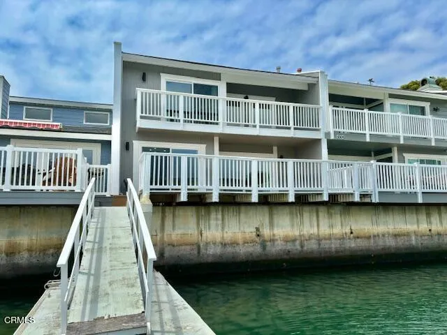 a view of a lake with a house