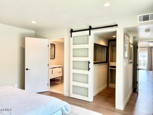 4510 Gateshead Bay Oxnard, CA 93035 - Photo 20 of 34 a bedroom with a bed and a view of closet