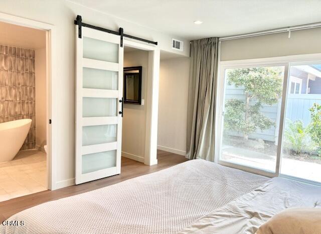 4510 Gateshead Bay Oxnard, CA 93035 - Photo 22 of 34 a bedroom with a bed and a window