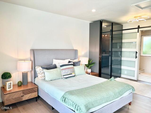 4510 Gateshead Bay Oxnard, CA 93035 - Photo 28 of 34 a bedroom with a bed and a window