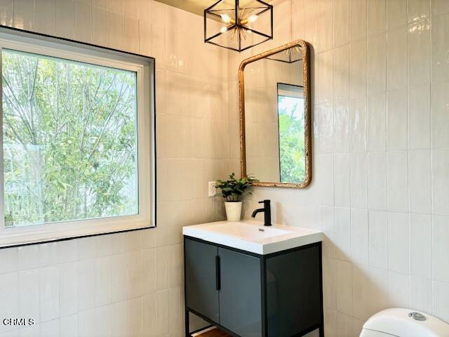 4510 Gateshead Bay Oxnard, CA 93035 - Photo 29 of 34 a bathroom with a sink and a mirror
