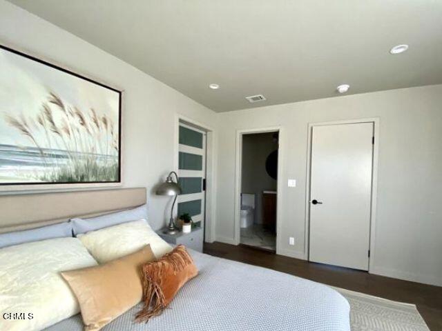4510 Gateshead Bay Oxnard, CA 93035 - Photo 33 of 34 a bedroom with a bed and a large window