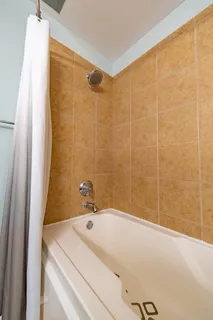 a bathroom with a sink and a shower