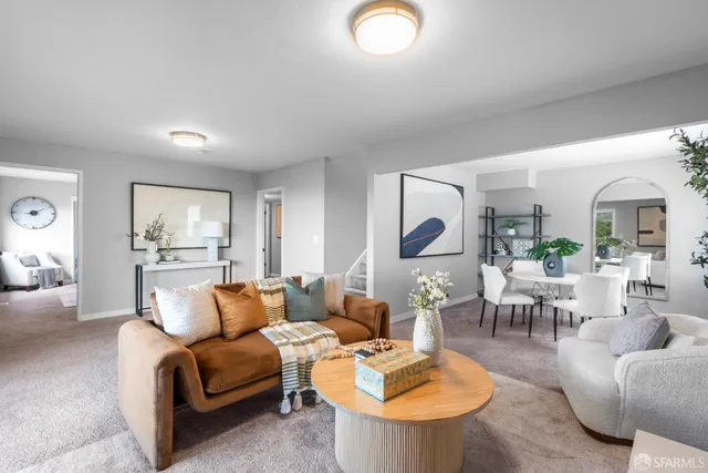 a view of a wooden deck with furniture