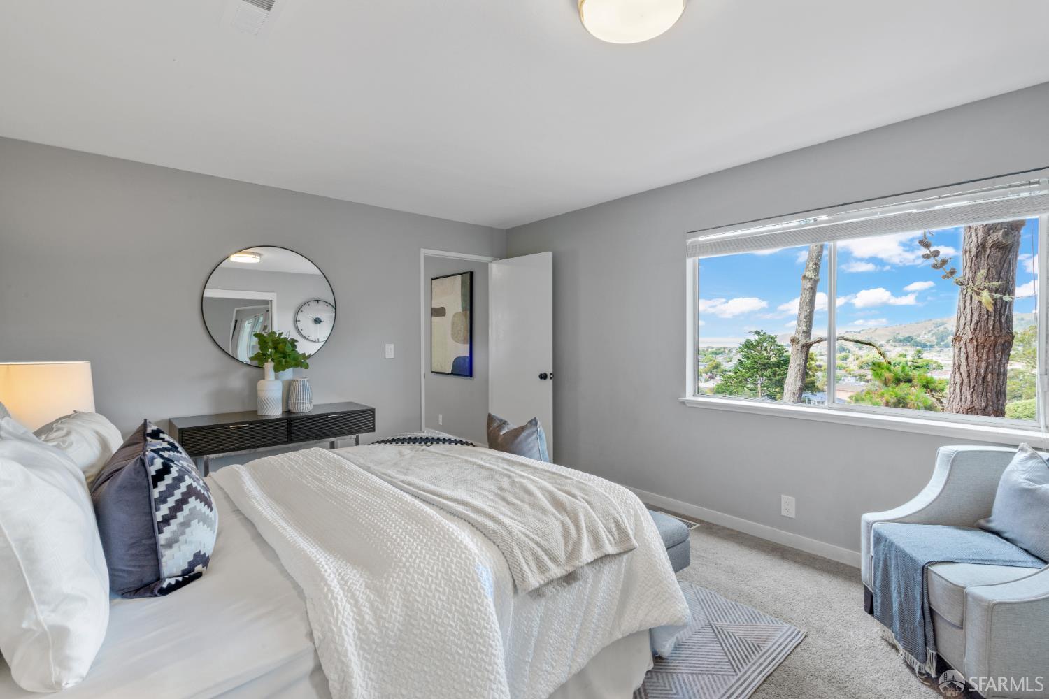 1669 Higgins Way Pacifica, CA 94044 - Photo 35 of 91 a bedroom with a bed and window