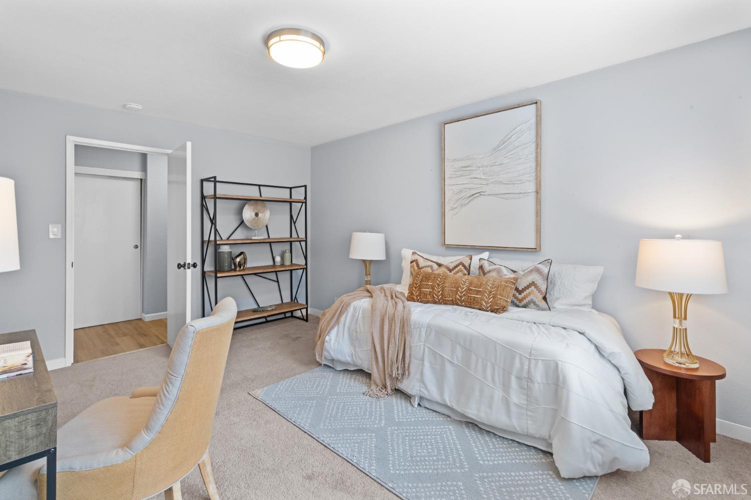 1669 Higgins Way Pacifica, CA 94044 - Photo 37 of 91 a bedroom with a bed lamps and a large mirror