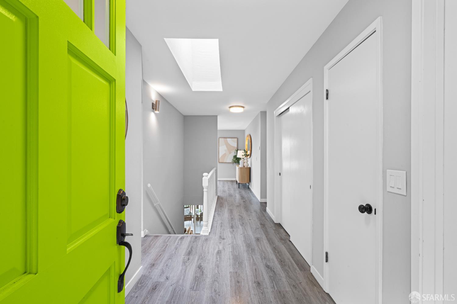 1669 Higgins Way Pacifica, CA 94044 - Photo 63 of 91 a view of a hallway with wooden floor and a hallway