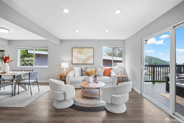 a dining room with furniture and window
