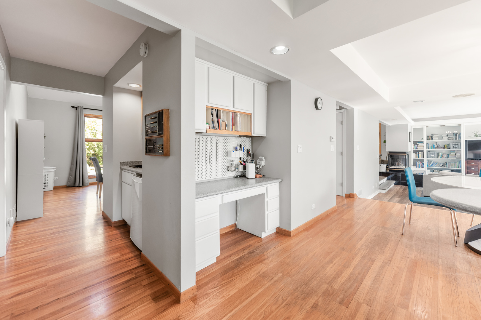 336 Roberts Road Inverness, IL 60010 - Photo 18 of 80 a view of a living room kitchen and a wooden floor