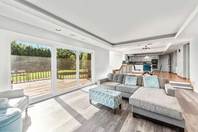 a room with gym equipment and windows