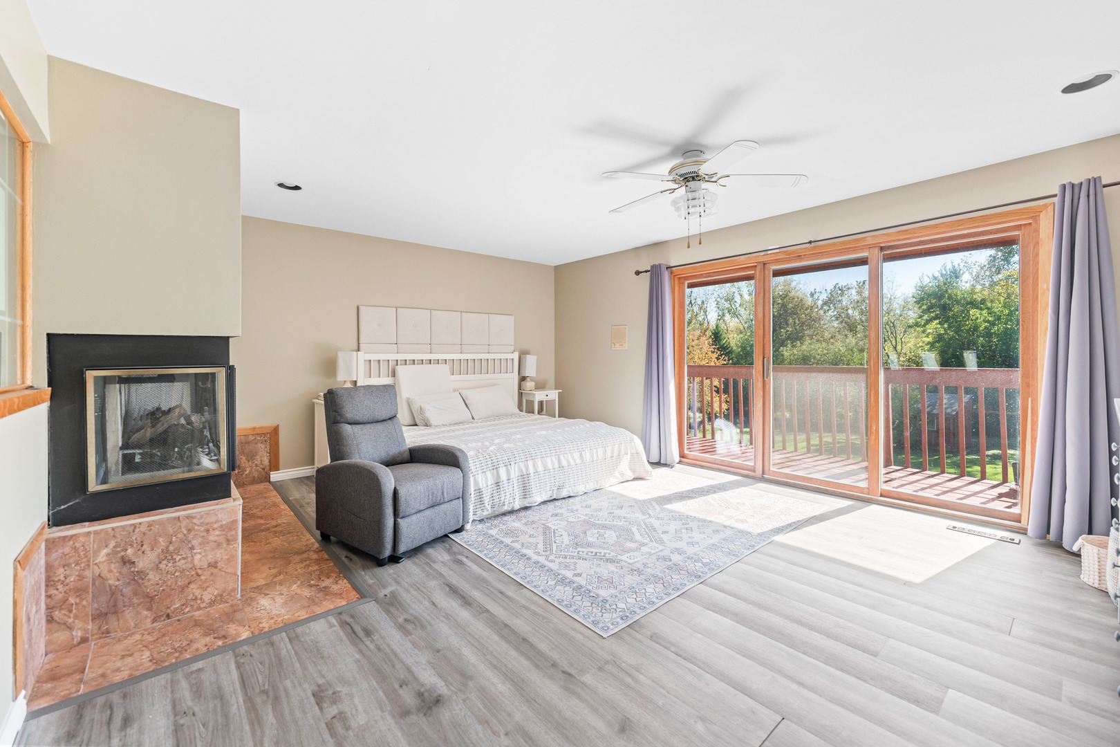 336 Roberts Road Inverness, IL 60010 - Photo 36 of 80 a spacious bedroom with a large bed and a large window