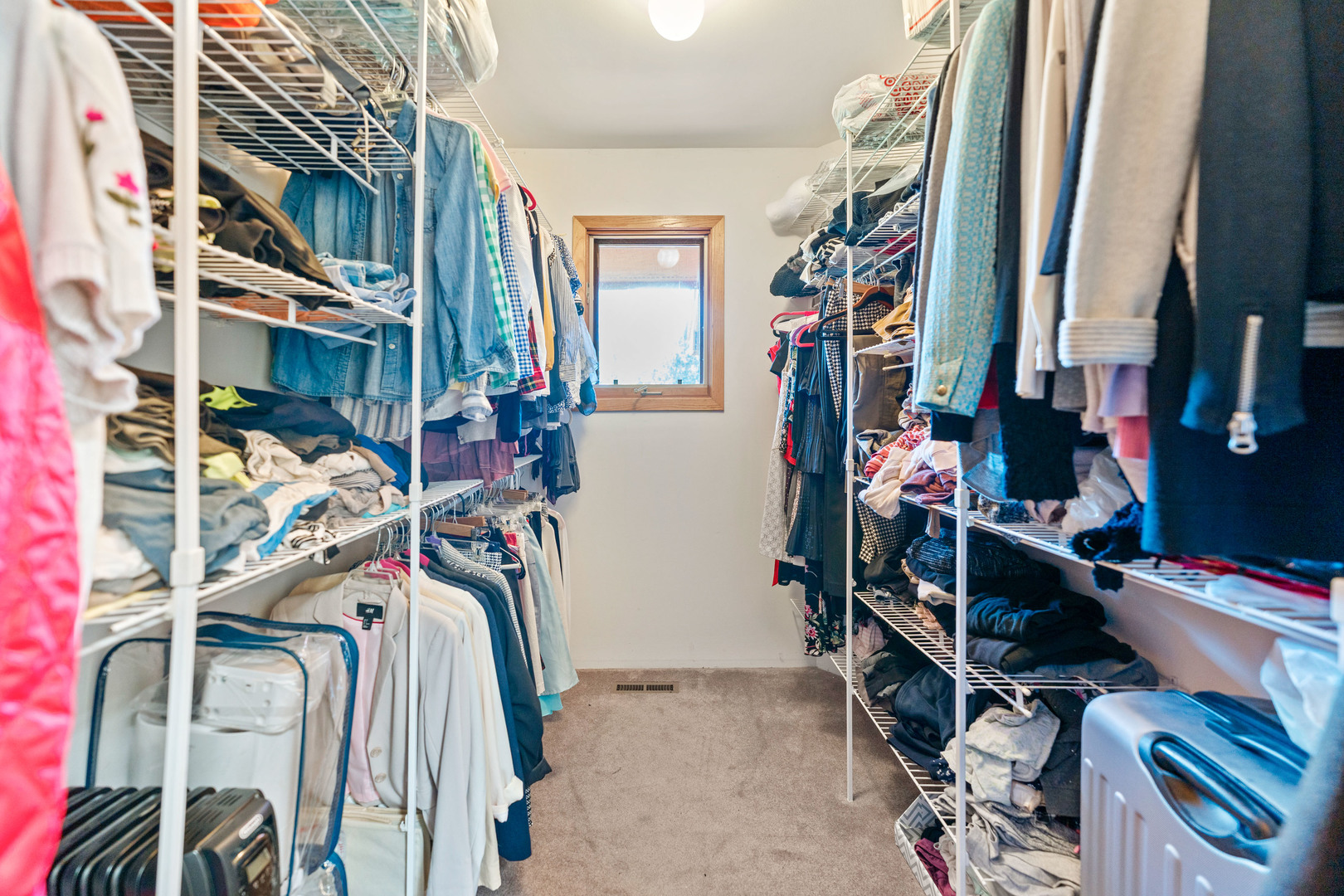 336 Roberts Road Inverness, IL 60010 - Photo 38 of 80 a view of walk in closet with clothes and shoes